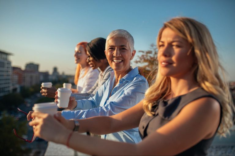 Happy people of all ages outside enjoying life